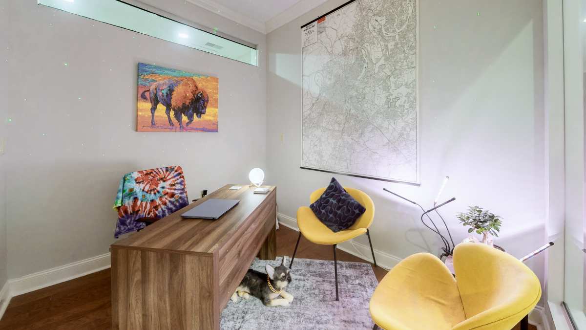 Consultation room with yellow chairs during PTSD Treatment in Nashville at Triony Behavioral Health