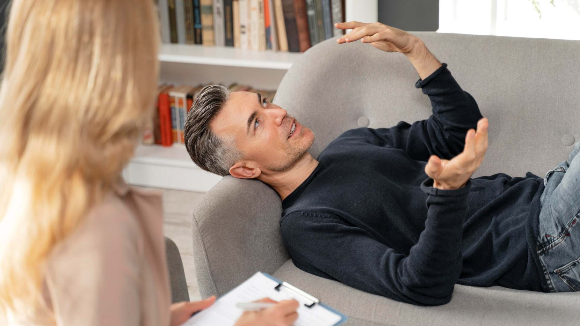 A man lying on a therapy couch during a counseling session for EMDR Therapy in Nashville
