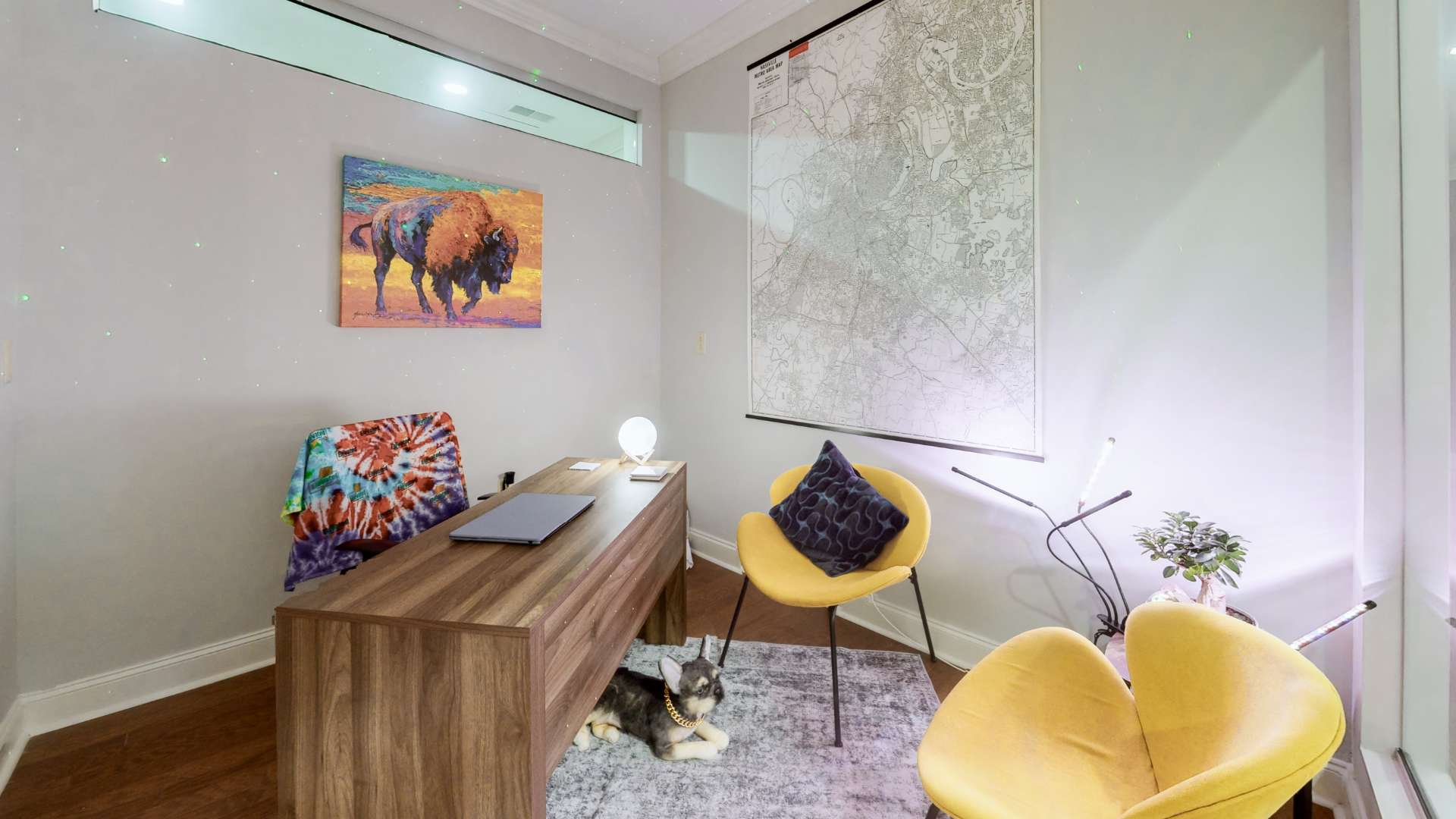 Consultation room in Nashville featuring a cozy yellow chair, designed for Attachment Based Therapy sessions
