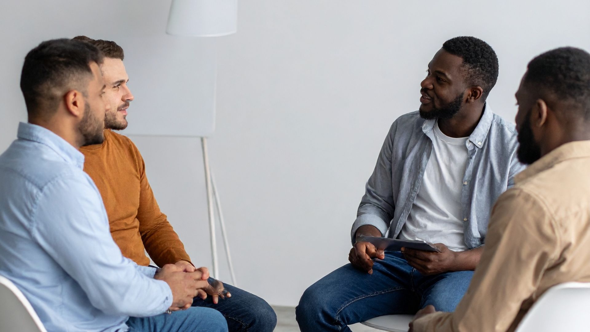 Four men in counselling as part of the Mental health treatment In Hermitage Tennessee